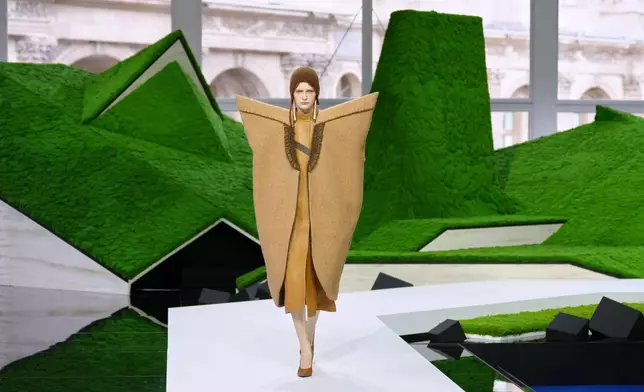 A model wears a creation from the Louis Vuitton Fall/Winter 2026-2027 Women's collection presented in Paris, Tuesday, March 10, 2026. (AP Photo/Aurelien Morissard)