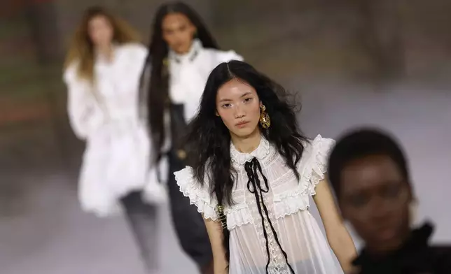 Models wear creations from the Chloe Fall/Winter 2026-2027 Women's collection presented in Paris, Thursday, March 5, 2026. (AP Photo/Tom Nicholson)