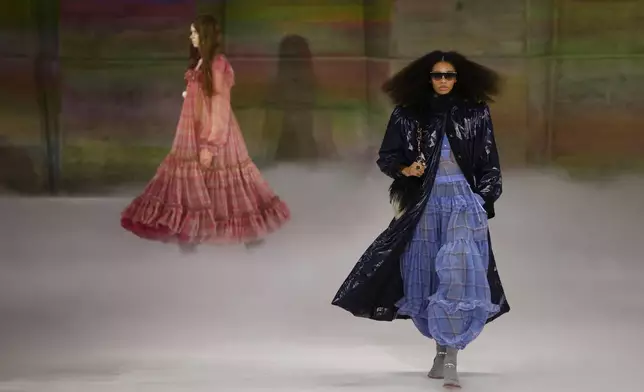 Models wear creations from the Chloe Fall/Winter 2026-2027 Women's collection presented in Paris, Thursday, March 5, 2026. (AP Photo/Tom Nicholson)