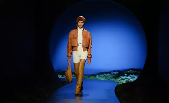 A model wears a creation as part of the Hermes Fall/Winter 2026-2027 Women's collection presented in Paris, Saturday, March 7, 2026. (AP Photo/Aurelien Morissard)