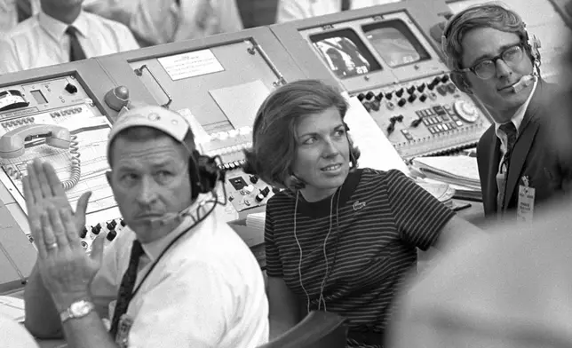 FILE - In this photo provided by NASA, JoAnn Morgan watches the launch of Apollo 11 from the launch firing room, July 16, 1969, in Cape Canaveral, Fla. (NASA via AP, File)
