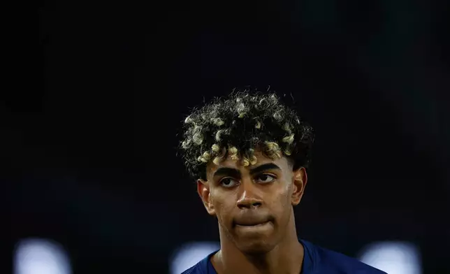 Barcelona's Lamine Yamal reacts during the Copa del Rey semifinal second leg soccer match between Barcelona and Atletico Madrid in Barcelona, Spain, Tuesday, March 3, 2026. (AP Photo/Joan Monfort)