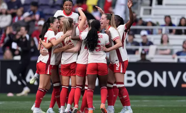 Team Canada celebrates a goal during the second half of a SheBelieves Cup women's soccer tournament match against Colombia, Sunday, March 1, 2026, in Nashville, Tenn. (AP Photo/George Walker IV)