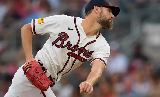 Atlanta Braves pitcher Chris Sale (51) deliveres in the first inning of an opening-day baseball game against the Kansas City Royals, Friday, March 27, 2026, in Atlanta. (AP Photo/Mike Stewart)