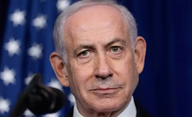 FILE - Israel's Prime Minister Benjamin Netanyahu listens during a news conference with President Donald Trump at Mar-a-Lago, Dec. 29, 2025, in Palm Beach, Fla. (AP Photo/Alex Brandon, File)