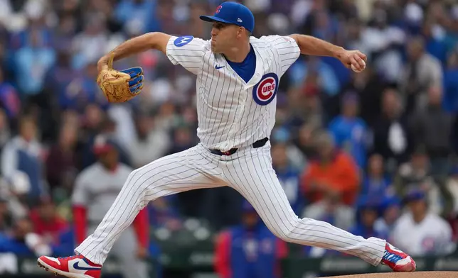 Chicago Cubs starting pitcher Matthew Boyd (16) throws against the Washington Nationals during the first inning of an opening-day baseball game Thursday, March 26, 2026, in Chicago. (AP Photo/Erin Hooley)