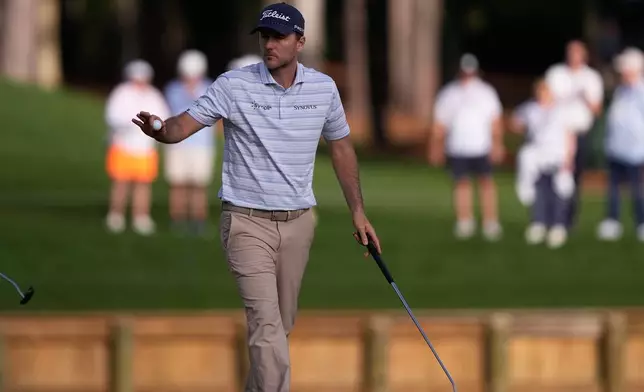 Russell Henley reacts after his birdie putt on the 11th green during the first round of The Players Championship golf tournament Thursday, March 12, 2026, in Ponte Bedra Beach, Fla. (AP Photo/Gerald Herbert)