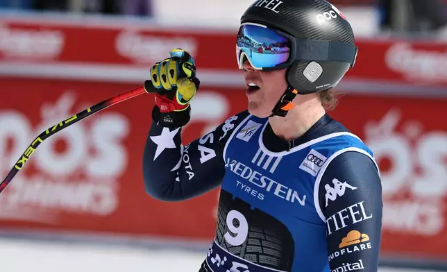 United States' Breezy Johnson celebrates at the finish area of an alpine ski, women's World Cup downhill, in Val di Fassa, Italy, Friday, March 6, 2026. (AP Photo/Marco Trovati) CORRECTION: Date corrected to March 6, instead of February 27.