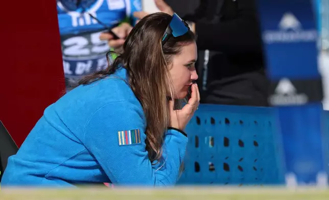 Italy's Laura Pirovano sits in the leaders' corner at the finish area of an alpine ski, women's World Cup downhill, in Val di Fassa, Italy, Friday, March 6, 2026. (AP Photo/Marco Trovati) CORRECTION: Date corrected to March 6, instead of February 27.
