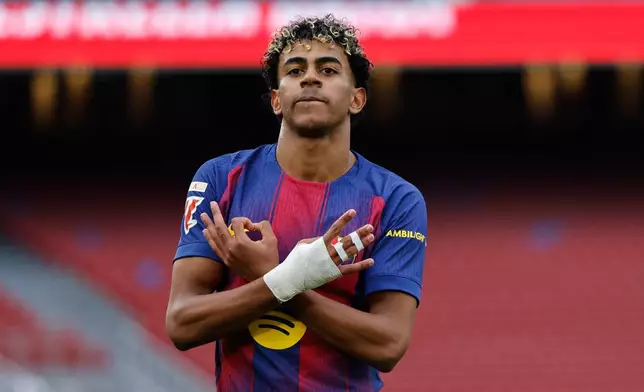 Barcelona's Lamine Yamal celebrates scoring his side's 2nd goal during the Spanish La Liga soccer match between Barcelona and Villareal in Barcelona, Spain, Saturday, Feb. 28, 2026. (AP Photo/Joan Monfort)