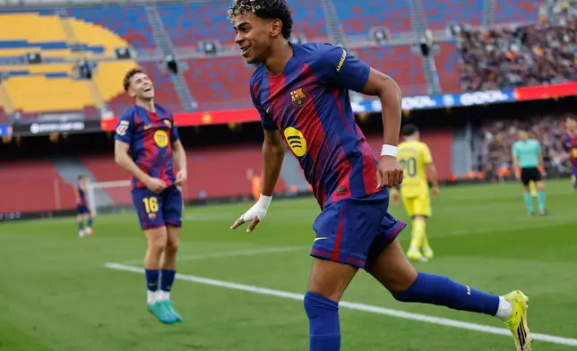 Barcelona's Lamine Yamal celebrates scoring his side's 2nd goal during the Spanish La Liga soccer match between Barcelona and Villareal in Barcelona, Spain, Saturday, Feb. 28, 2026. (AP Photo/Joan Monfort)