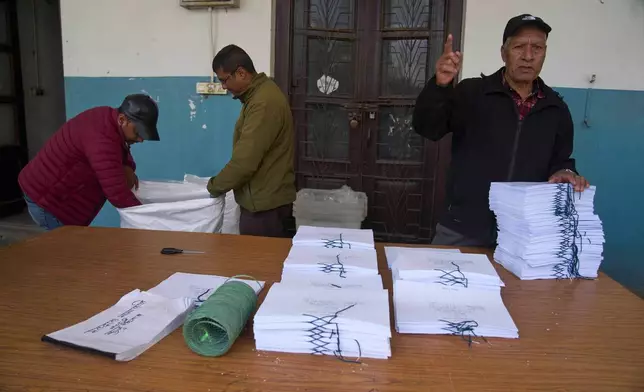 FILE - Staff members prepare for the upcoming general election scheduled for March 5, at the Election Commission in Kathmandu, Nepal, on Jan. 30, 2026. (AP Photo/Niranjan Shrestha, File)