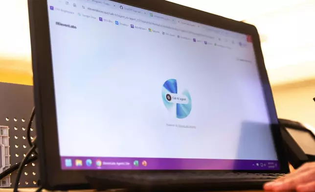 Professor Panos Ipeirotis uses an oral AI agent during his class at NYU Stern School of Business, March 4, 2026, in New York. (AP Photo/Heather Khalifa)