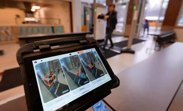 An alert resolution tablet is seen in the security area at Midtown High School, Friday, March 6, 2026, in Atlanta. (AP Photo/Mike Stewart)