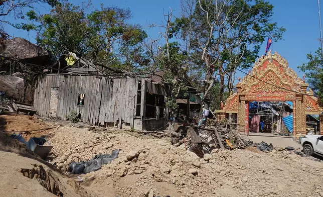 A Buddhist pagoda located beside Preah Vihear temple is seen damaged after border clashes with Thailand, at Preah Vihear province, Cambodia, Saturday, March 14, 2026. (AP Photo/Heng Sinith)