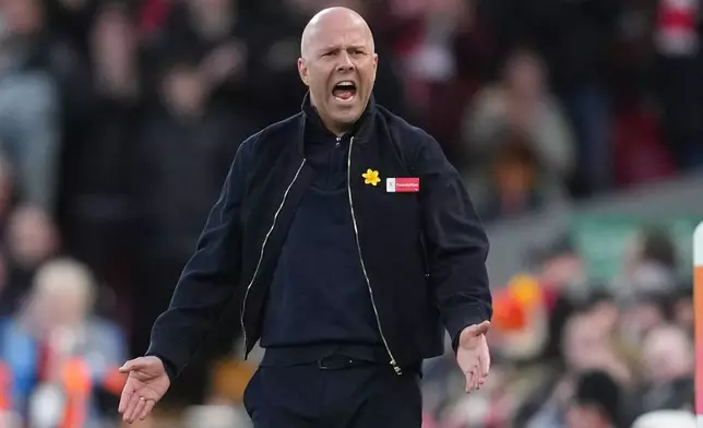 Liverpool's manager Arne Slot reacts during the Premier League soccer match between Liverpool and Tottenham in Liverpool, England, Sunday, March 15, 2026. (AP Photo/Jon Super)