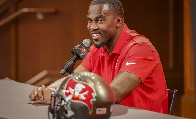 Tampa Bay Buccaneers' Lavonte David speaks as he announces his retirement during an NFL football news conference, Tuesday, March 24, 2026 in Tampa. (Chris Urso/Tampa Bay Times via AP)