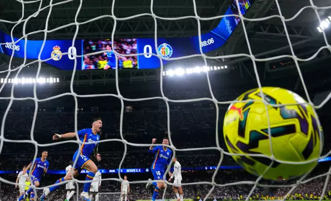 Getafe's Satriano celebrates the opening goal during a Spanish La Liga soccer match between Real Madrid and Getafe in Madrid, Spain, Monday, March 2, 2026. (AP Photo/Manu Fernandez)