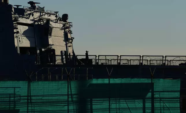 A German U.N. soldier stands aboard the UNIFIL ship FGS Nordrhein-Westfalen while the vessel is docked at the port of Limassol, Cyprus, Sunday, March 8, 2026. (AP Photo/Petros Karadjias)