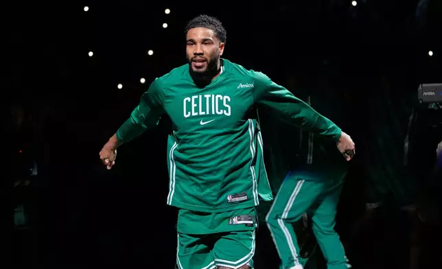 Boston Celtics forward Jayson Tatum is introduced prior to an NBA basketball game against the Dallas Mavericks, Friday, March 6, 2026, in Boston. (AP Photo/Charles Krupa)