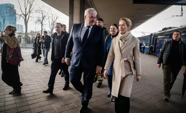 In this photo provided by the Ukrainian Foreign Ministry Press Office, High Representative of the European Union for Foreign Affairs and Security Policy Kaja Kallas, centre right, and Ukraine's Foreign Minister Andrii Sybiha walk at a railway station in Kyiv, Ukraine, Tuesday, March 31, 2026. (Ukrainian Foreign Ministry Press Office via AP)