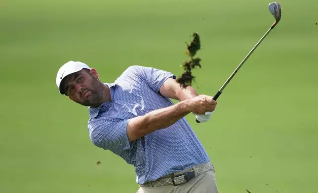 Scottie Scheffler hits from the fairway on the first hole during the first round of the Arnold Palmer Invitational at Bay Hill golf tournament Thursday, March 5, 2026, in Orlando, Fla. (AP Photo/Matt Slocum)