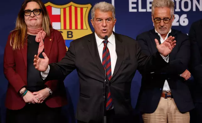 Joan Laporta gestures as he speaks after being elected president of FC Barcelona following the soccer club's presidential election in Barcelona, Spain, early Monday, March 16, 2026. (AP Photo/Joan Monfort)