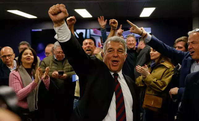Candidate, Joan Laporta reacts during early voting projections for the election to be president of FC Barcelona soccer club in Barcelona, Spain, Sunday, March 15, 2026. (AP Photo/Joan Monfort)