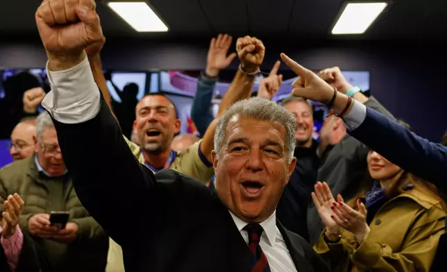 Candidate, Joan Laporta reacts during early voting projections for the election to be president of FC Barcelona soccer club in Barcelona, Spain, Sunday, March 15, 2026. (AP Photo/Joan Monfort)