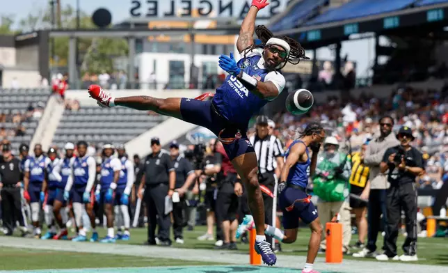 U.S. National Flag team's Tyler Davis misses a catch in the end zone against the Wildcats FFC during the Fanatics Flag Football Classic, Saturday, March 21, 2026, in Los Angeles. (AP Photo/Caroline Brehman)