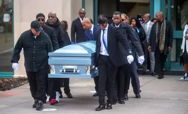 Pallbearers carry out the casket of Steven Jone, a man in a mental health crisis who was shot by police, following Jones' funeral service at The First Cathedral, Thursday, March 26, 2026 in Bloomfield, Conn. (Aaron Flaum/Hartford Courant via AP)