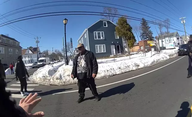 This photo taken from Hartford Police body camera video shows Steven Jones as police officers talk to him, Friday, Feb. 27, 2026 in Hartford, Conn. (Hartford Police Department via AP)