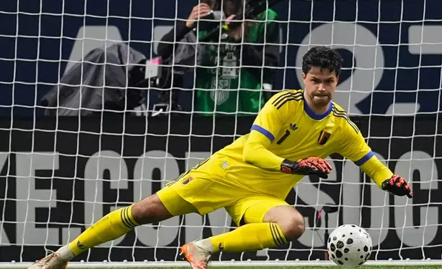 Belgium goalkeeper Senne Lammens makes a save against the United States during an international friendly soccer match, Saturday, March 28, 2026, in Atlanta. (AP Photo/Mike Stewart)