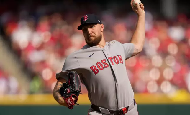 Boston Red Sox pitcher Garrett Crochet throws during the first inning of an opening-day baseball game against the Cincinnati Reds in Cincinnati, Thursday, March 26, 2026. (AP Photo/Carolyn Kaster)