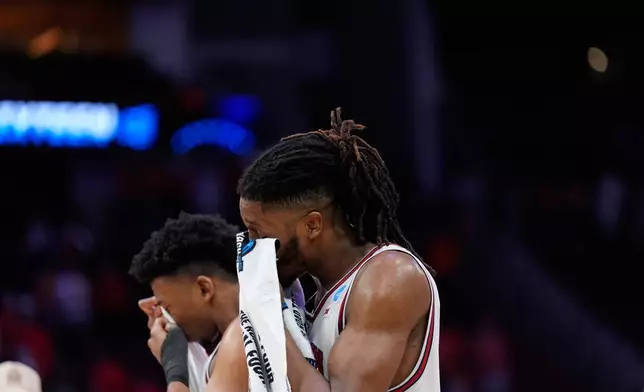 during the second half in the Sweet 16 of the NCAA college basketball tournament Friday, March 27, 2026, in Houston. (AP Photo/Ashley Landis)
