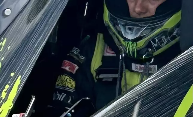 NHRA driver Maddi Gordon waits in her dragster before an elimination run at the Gatornationals, at Gainesville Raceway in Gainesville, Fla., Sunday, March 8, 2026. (AP Photo/Mark Long)