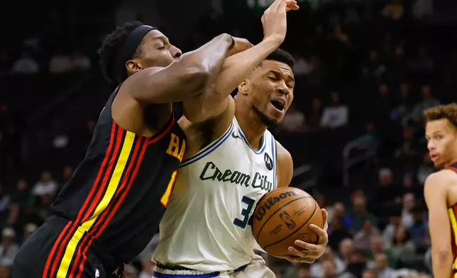 Milwaukee Bucks forward Giannis Antetokounmpo drives agains the Atlanta Hawks during the first half of an NBA basketball game Wednesday, March 4, 2026, in Milwaukee. (AP Photo/Jeffrey Phelps)