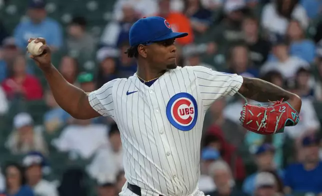 Chicago Cubs pitcher Edward Cabrera (30) pitches against the Los Angeles Angels during the first inning in a baseball game Monday, March 30, 2026, in Chicago. (AP Photo/David Banks)
