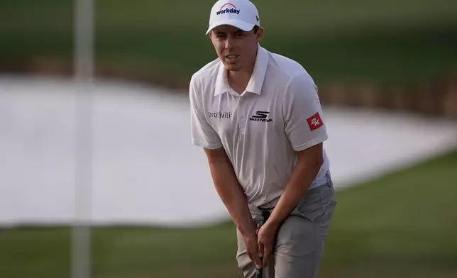 Matt Fitzpatrick of England, reacts to his putt on the 16th green during the final round of The Players Championship golf tournament, Sunday, March 15, 2026, in Ponte Vedra Beach, Fla. (AP Photo/Gerald Herbert)