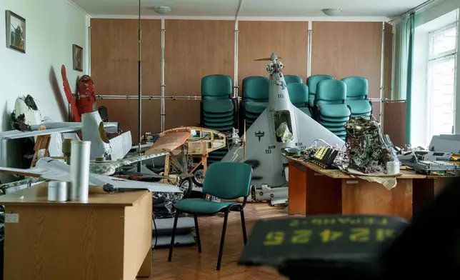 FILE - Parts of downed Shahed drones launched by Russia are piled in a storage room of a research laboratory in Kyiv, Ukraine, on Aug. 28, 2024. (AP Photo/Evgeniy Maloletka, File)