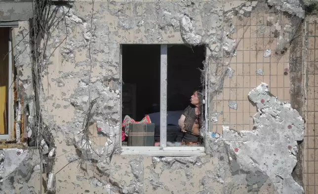 FILE - An apartment building is damaged during a massive Russian drone strike, amid Russia's attack on Ukraine, in Odesa, Ukraine, Saturday, June 10, 2023. (AP Photo/Nina Lyashonok, File)