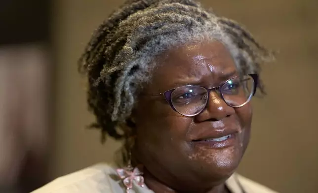 Anehtra Richmond of Woodbridge, Va., speaks to a reporter while visiting the National Museum of African American History and Culture, Friday, March 6, 2026, in Washington. (AP Photo/Jacquelyn Martin)