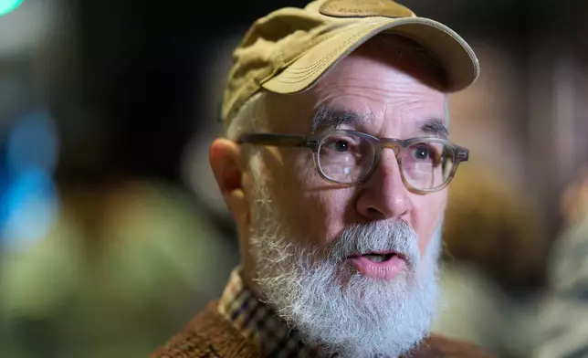 Jim Cairnes of Birmingham, Ala., speaks to a reporter while visiting the National Museum of African American History and Culture, Friday, March 6, 2026, in Washington. (AP Photo/Jacquelyn Martin)