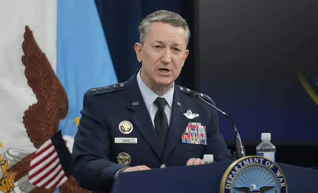 Chairman of the Joint Chiefs of Staff Gen. Dan Caine speak during a press briefing at the Pentagon, Monday, March 2, 2026, in Washington. (AP Photo/Mark Schiefelbein)