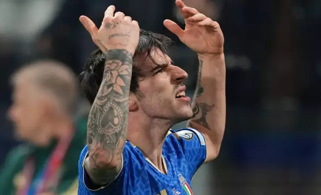 Italy's Sandro Tonali celebrates after scoring his side's first goal during the World Cup qualifying play-off soccer match between Italy and Northern Ireland, in Bergamo, Italy, Thursday, March 26, 2026. (AP Photo/Antonio Calanni)