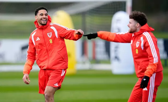 Wales' Ben Cabango, left, and Neco Williams during a training session, in Hensol, England, Wednesday March 25, 2026. (Nick Potts/PA via AP)