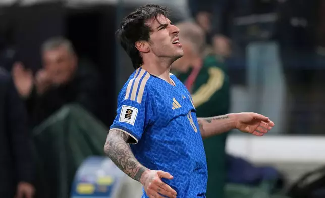 Italy's Sandro Tonali celebrates after scoring his side's first goal during the World Cup qualifying play-off soccer match between Italy and Northern Ireland, in Bergamo, Italy, Thursday, March 26, 2026. (AP Photo/Antonio Calanni)