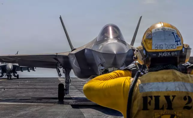 This image provided by U.S. Central Command shows a F-35C Lightning II preparing for launch on the flight deck of the USS Abraham Lincoln (CVN 72) in support of Operation Epic Fury on Monday, March 2, 2026. (U.S. Navy via AP)