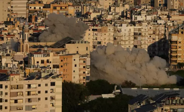 Smoke rises from Israeli airstrikes in Dahiyeh, a southern suburb of Beirut, Lebanon, Tuesday, March 3, 2026. (AP Photo/Hussein Malla)