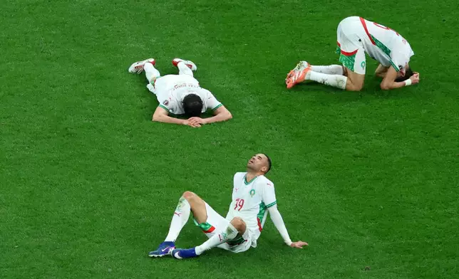 FILE - Morocco players react after losing the Africa Cup of Nations final soccer match between Senegal and Morocco in Rabat, Morocco, Sunday, Jan. 18, 2026. (AP Photo/Youssef Loulidi, File)